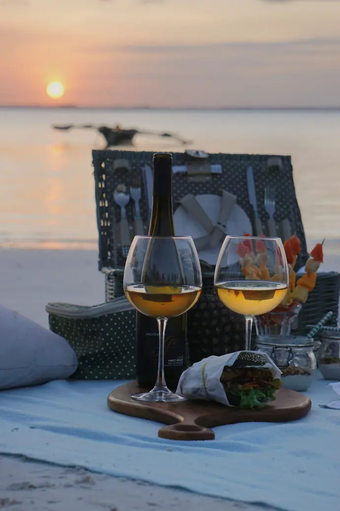 a couple of wine glasses sitting on top of a table